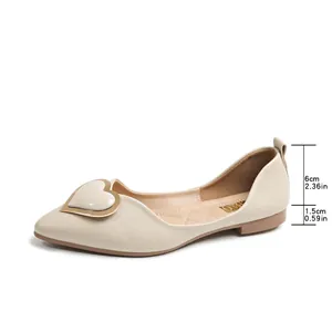 Detailed side view of pointed cream ballet flats with heart buckle and heel measurements.