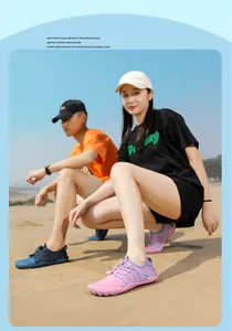 Close-up of pink and blue lightweight barefoot water shoes for beach and outdoor activities