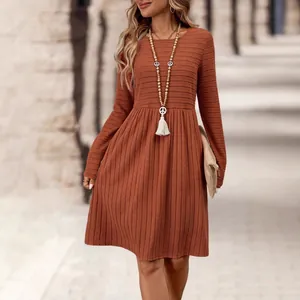 Elegant rust red ribbed long-sleeved casual dress with round neck and high waist line