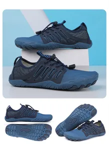 Dettagli scarpe da scoglio blu a piedi nudi con suole in gomma antiscivolo
