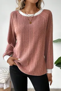 Detailed view of the mauve ribbed knit sweater featuring white contrasting collar and cuffs