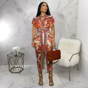 Elegante vestido midi estampado de inspiración africana con escote en V y manga corta