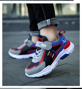 Detail view of waterproof boys' sports sneakers on a child model for outdoor wear.