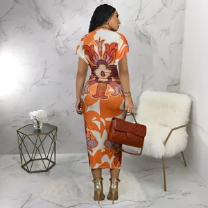 Elegante vestido midi con estampado africano naranja cuello en V y manga corta vista trasera