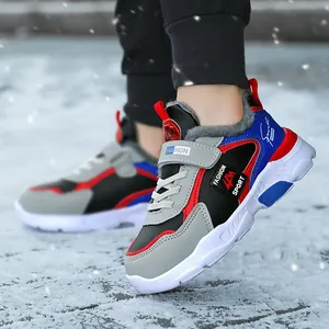Boys' waterproof winter sneakers with warm fur lining for outdoor sports in snow scene