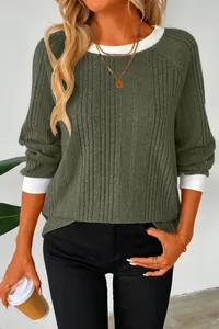 Detailed view of women's olive green ribbed sweater with white contrast collar