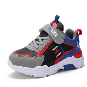 Side view of boys color-block running sneakers featuring grey, blue and red panels