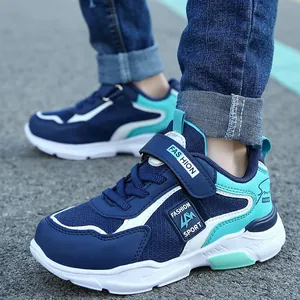 Boys' breathable color-block running sneakers in blue and teal with Velcro straps