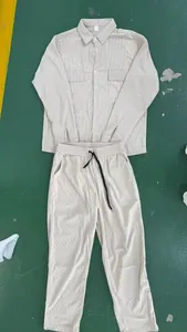 Detailed view of the ribbed corduroy fabric on this beige men's casual two-piece set.