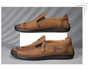 Brown men's casual leather loafers with zipper detail and hand-stitched sole