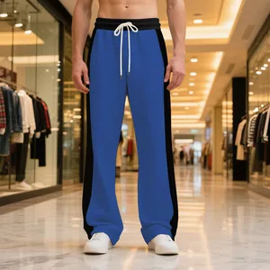 Heavyweight blue and black contrast straight-leg drawstring sweatpants on a model