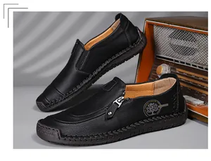 Detailed view of handmade black leather loafers for men featuring a stylish side zipper