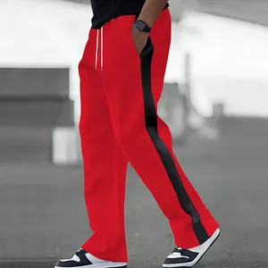 Detail view of red men's heavy fleece sweatpants with black side stripe and drawstring