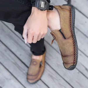 Handmade brown leather loafers for men with decorative zipper and slip-on design