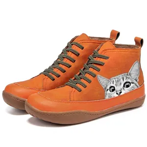Retro orange high-top Martin boots featuring a realistic cat head print and gray laces