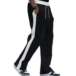 Side detail view of men's heavy black joggers with bold white contrast side stripes