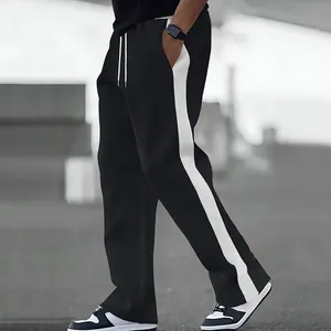 Side detail view of men's heavy fleece drawstring sweatpants with contrast white stripes
