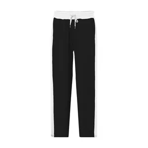 Detailed view of men's heavyweight black and white contrast color loose sports pants