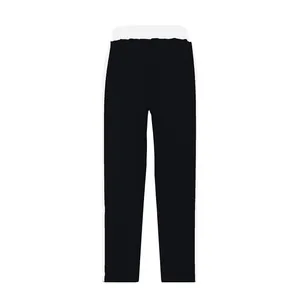 Front view detail of black straight-leg sweatpants with white side stripes and waistband
