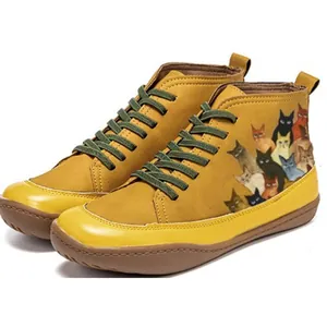 Retro mustard yellow high-top Martin boots featuring colorful cartoon cat print for women