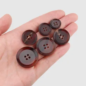 Assorted natural brown water buffalo horn buttons for luxury overcoats and suits