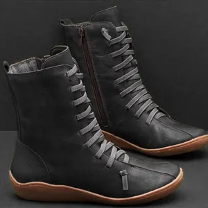 Vintage style minimalist black leather boots with side zipper and gray laces for women