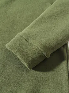Detailed close-up showing the soft olive green coral fleece cuff on a men's sweatshirt