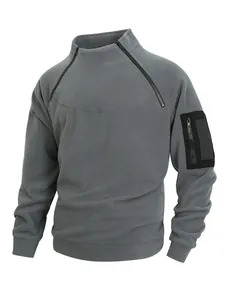 Close-up of men's grey coral fleece sweatshirt with shoulder zippers and utility sleeve pocket