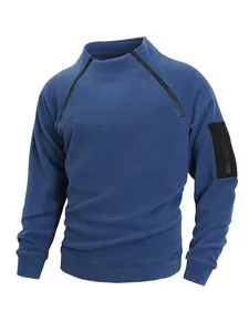 Detail of men's blue slim-fit fleece pullover featuring unique dual zippers and arm pocket