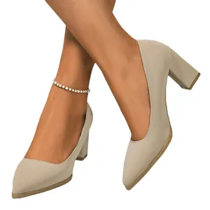 Elegant beige pointed-toe pumps with block heels for professional office or formal wear