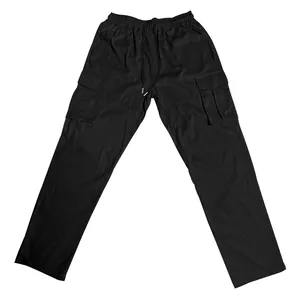 Detailed front view of men's loose black drawstring cargo pants featuring side pockets
