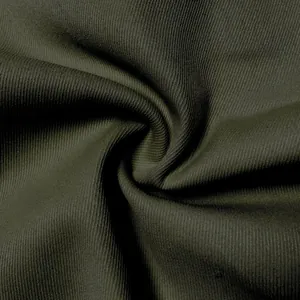 Close-up detail of army green ribbed cotton fabric for men's casual cargo pants