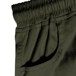 Close-up detail of men's casual cargo pants featuring side pocket and elastic waistband
