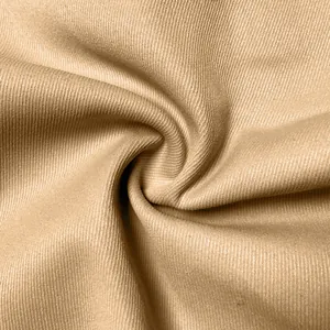 Close-up of khaki woven fabric showing premium texture for men's cargo pants