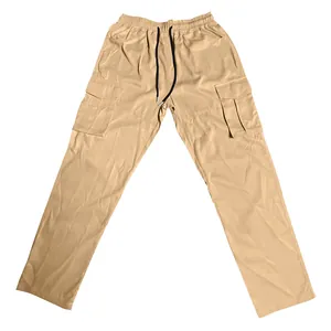 Detailed view of men's khaki cargo pants featuring drawstring waist and multiple pockets