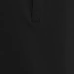 Macro detail showing the reinforced X-stitch on the placket of a black men's Henley shirt.