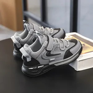 Grey and black boys' leather sports sneakers with hook-and-loop straps