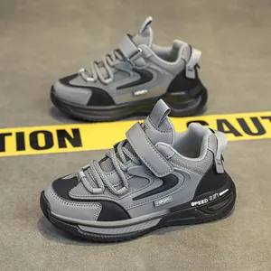 Boys' stylish grey leather dad shoes with adjustable velcro strap and thick running sole