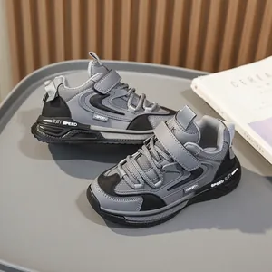 Grey and black boys' leather sports sneakers with convenient hook and loop closure