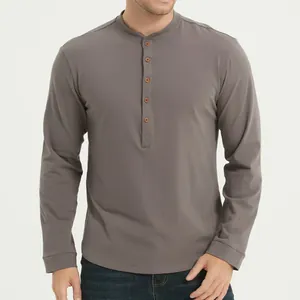 Close-up detail of a breathable men's long-sleeve Henley shirt with wood buttons