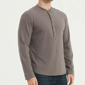 Detailed side view of a men's slim fit long sleeve breathable Henley shirt in taupe color