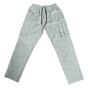 Full view of grey straight-leg cargo pants for men featuring multi-pockets and drawstring