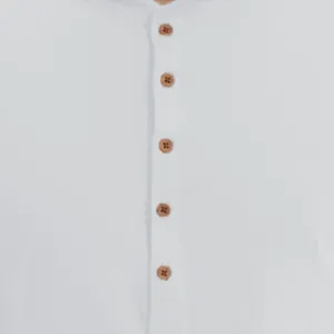 Close-up of white Henley shirt showing brown button detail and placket stitching