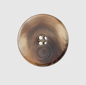Detailed macro view of a high-end round resin button with brown marble texture