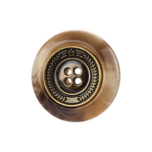 High-end vintage resin button with a bronze metal center and marbled brown texture detail