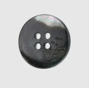 Macro view of high-quality natural black mother of pearl shell button with 4 holes