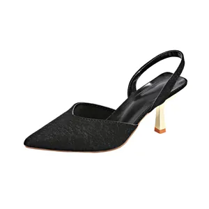 Elegant black glitter pointed-toe slingback sandal with metallic gold kitten heel