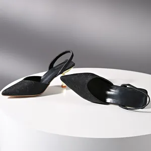 Elegant black glitter pointed toe slingback heels with slim gold stiletto heel detail