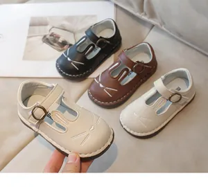 Cute rabbit design girl's leather Mary Jane shoes shown in black, brown, and beige colors