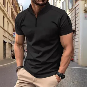 Close-up of men's tactical black polo shirt with quarter zip and arm pocket detail